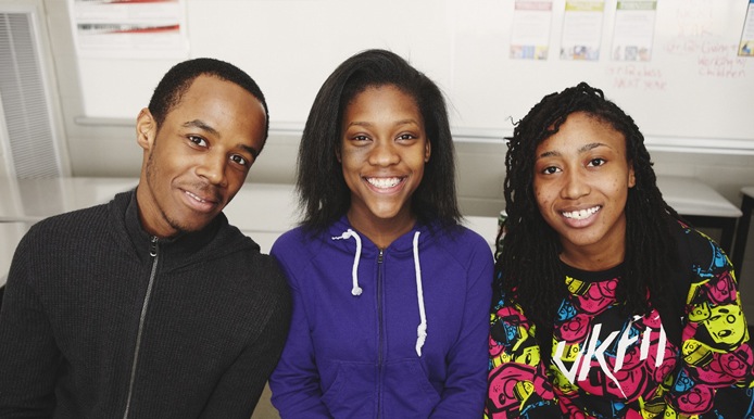 3 students smiling