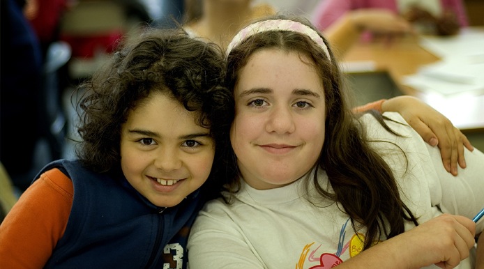 2 students smiling