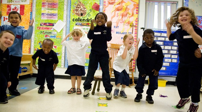 group of kids cheering